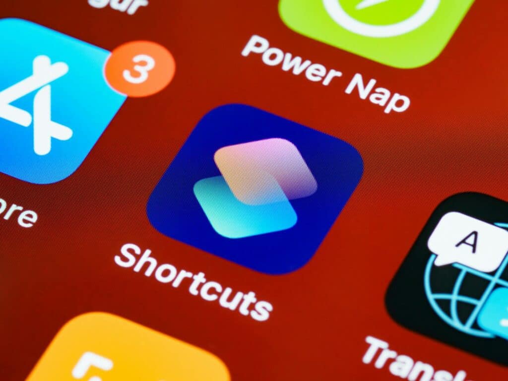 Detailed close-up of smartphone home screen displaying app icons like Shortcuts and Power Nap.