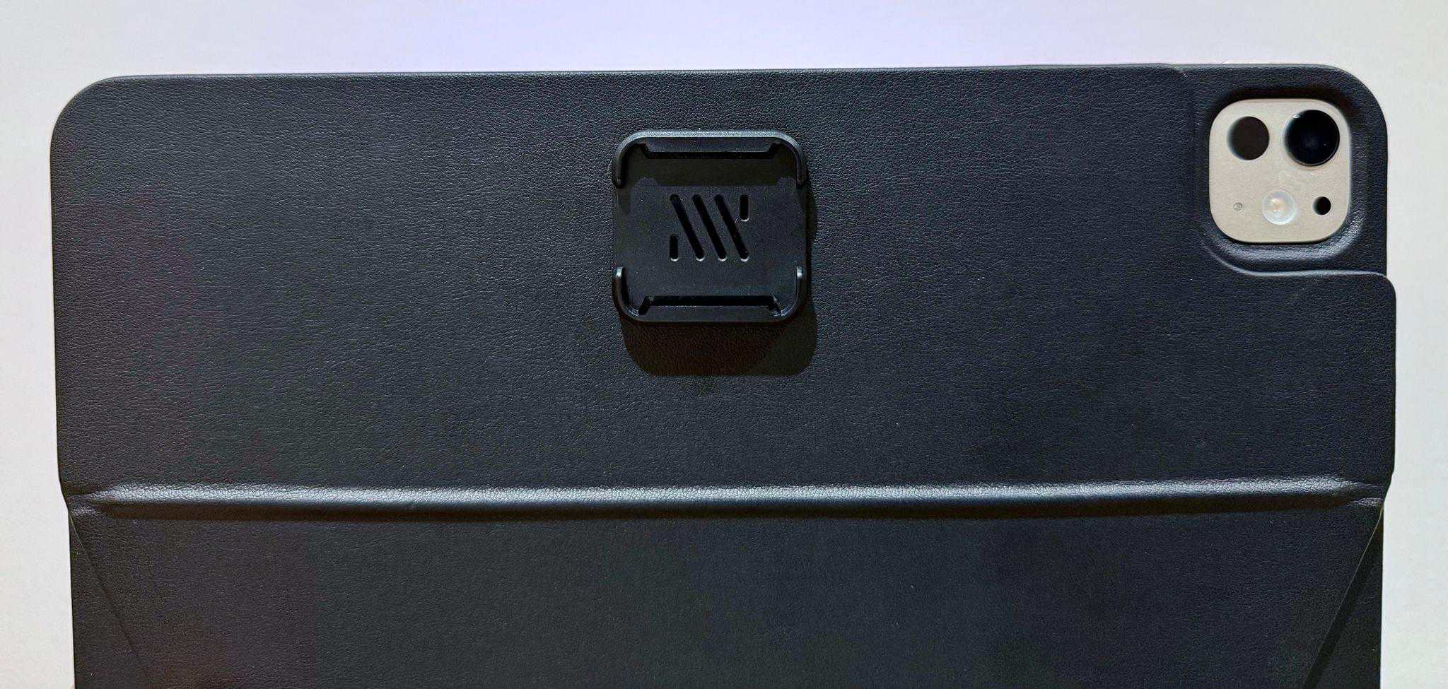 The mounting clip attached to the back cover.