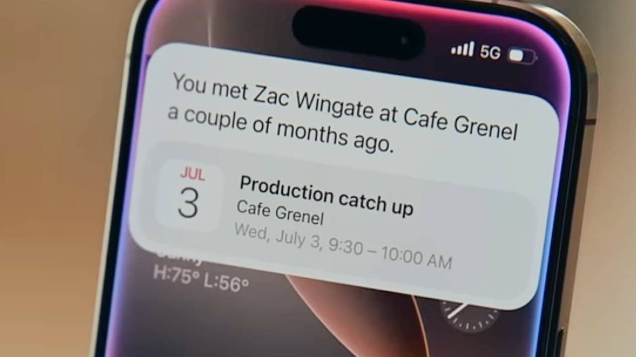 Smartphone calendar notification displaying a meeting with Zac Wingate at Cafe Grenel on July 3, from 9:30 to 10:00 AM.