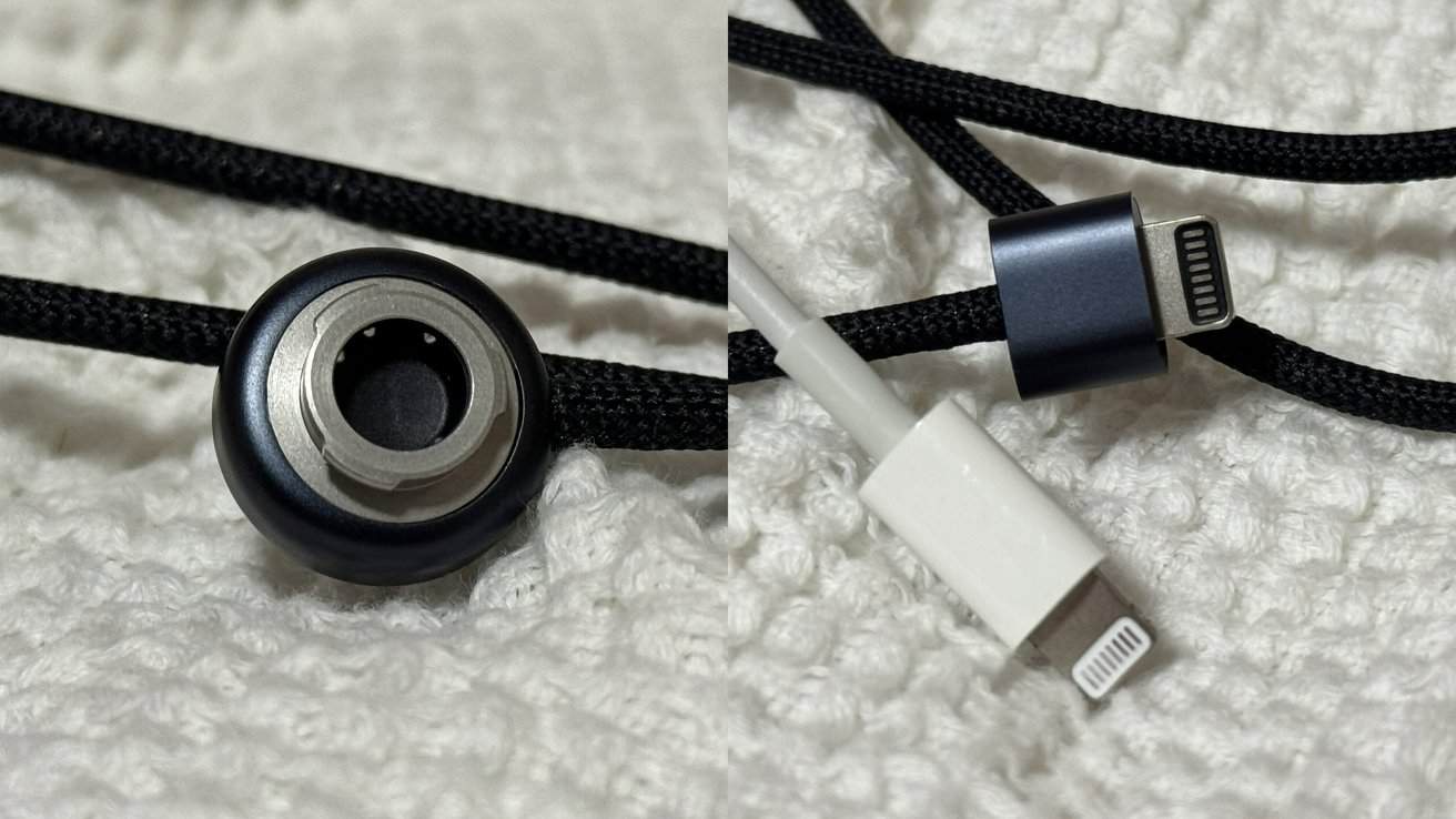 Close-up of two charging cables with black braided cords, one with a magnetic connector and the other with a lightning connector, lying on a textured white surface.