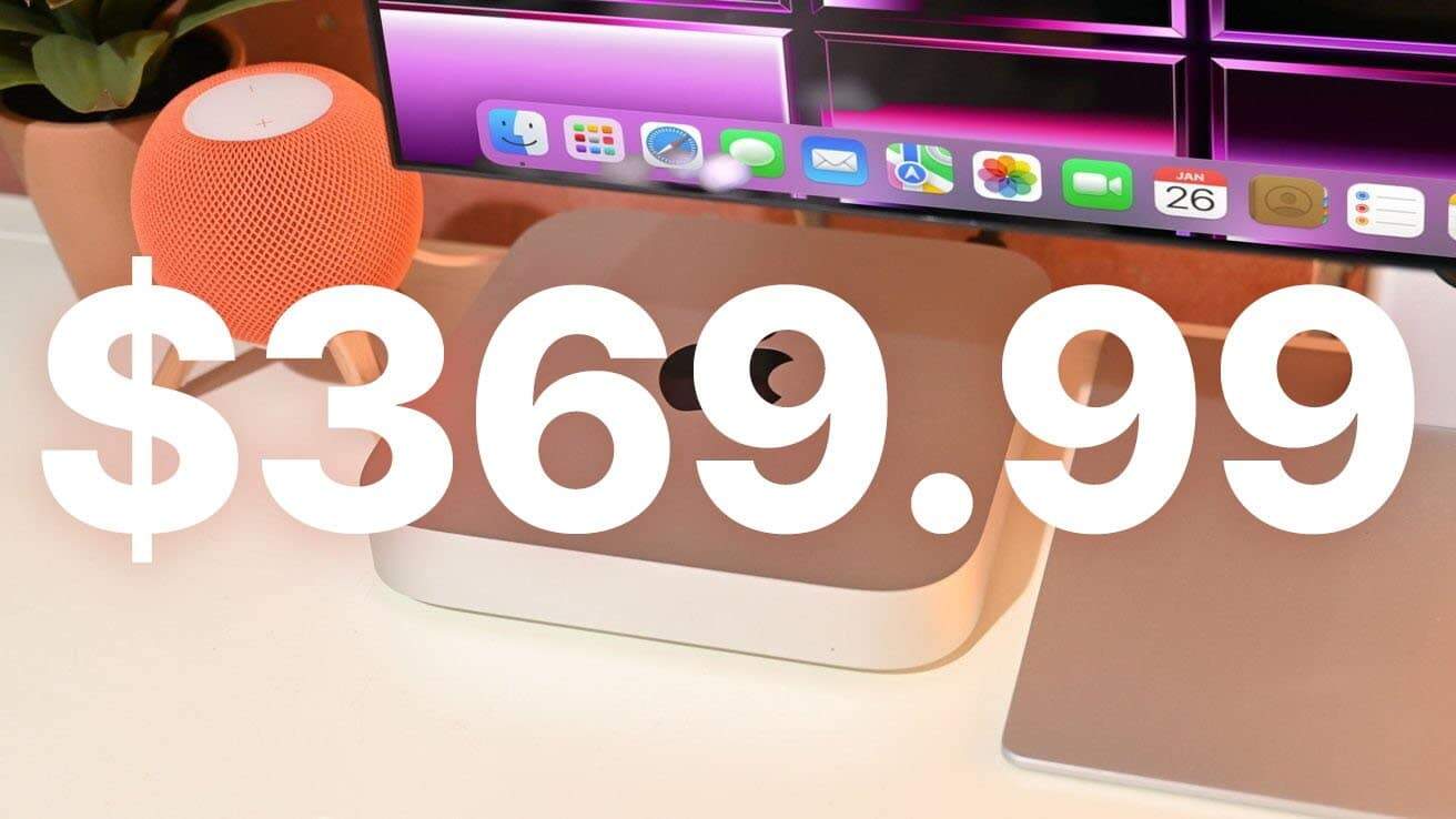Apple Mac mini M2 setup with a monitor displaying app icons, an orange HomePod speaker, and text showing the price $369.99.