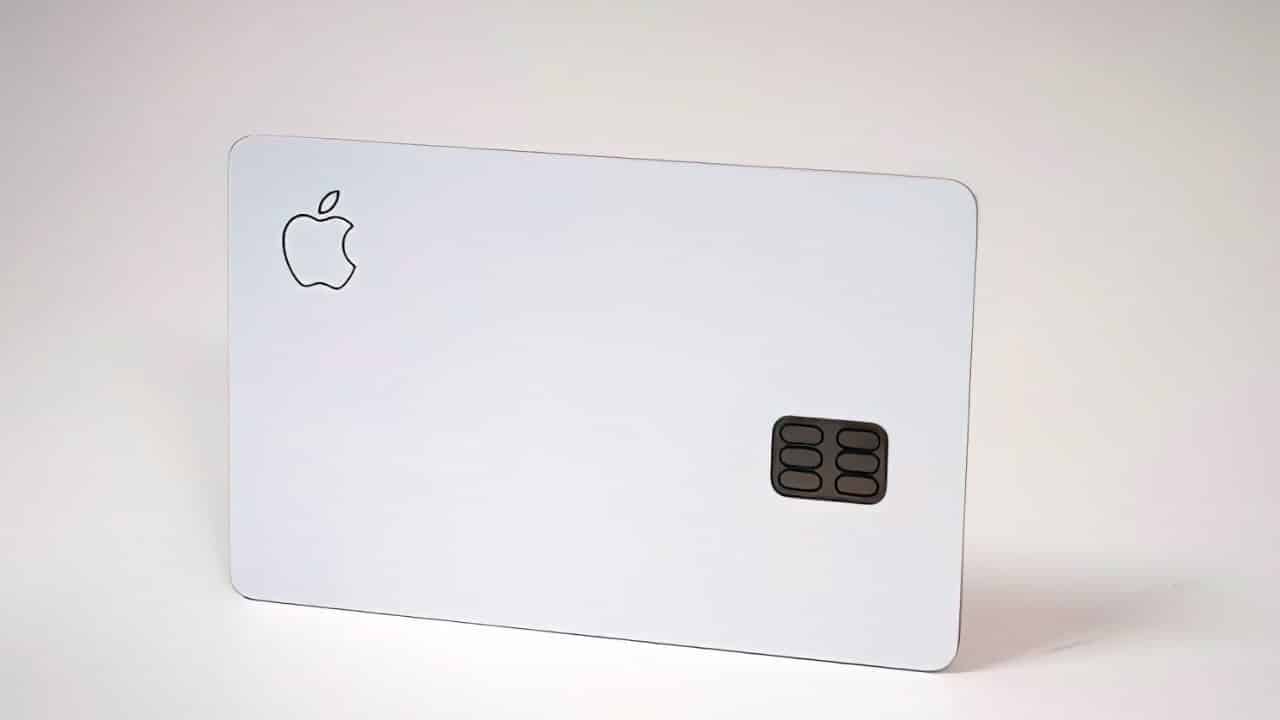 Minimalist white card featuring a logo on the left and a chip on the right.