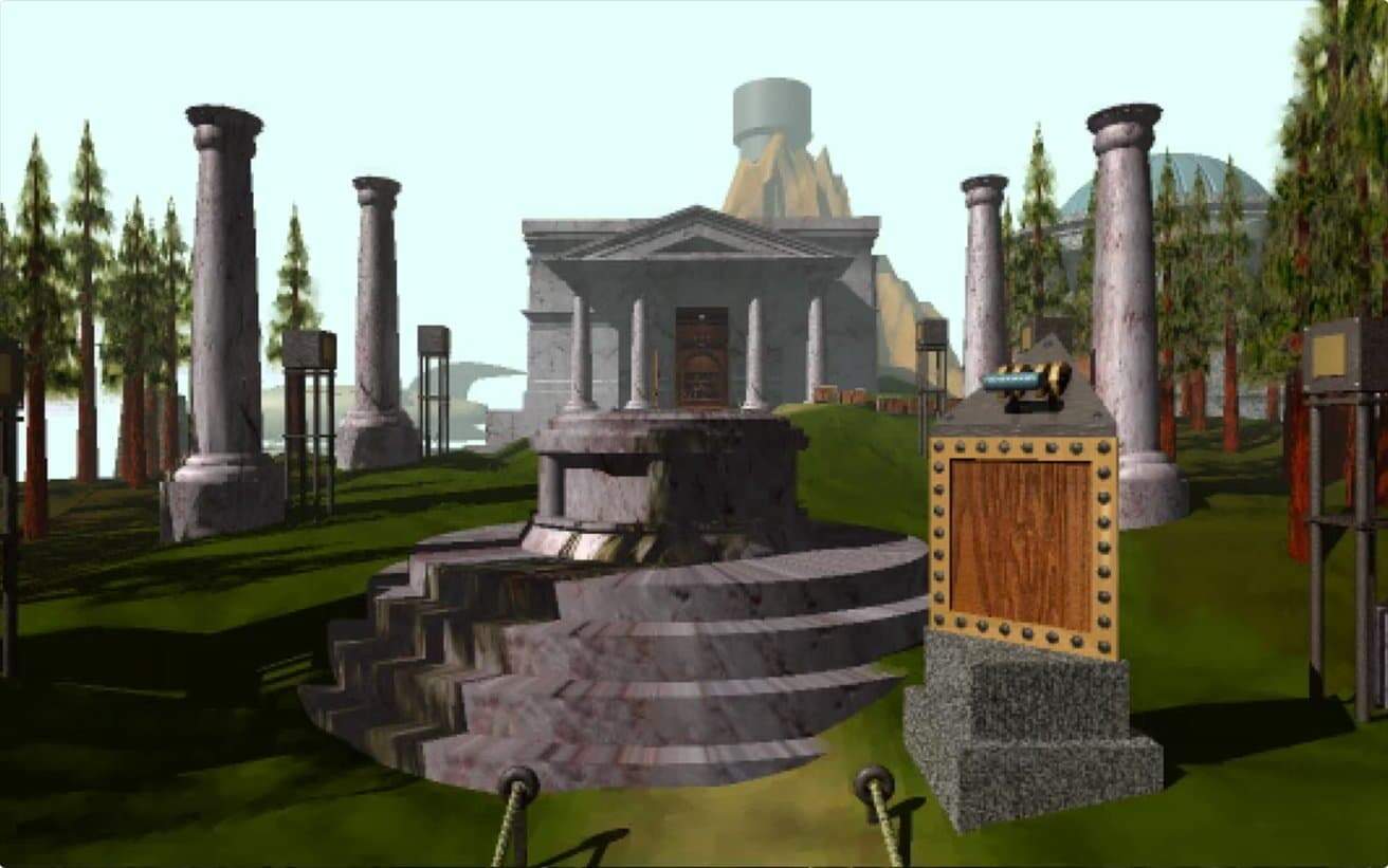 Stone temple with columns on a grassy hill, surrounded by trees and various stone structures. Majestic landscape with mountains in the background.