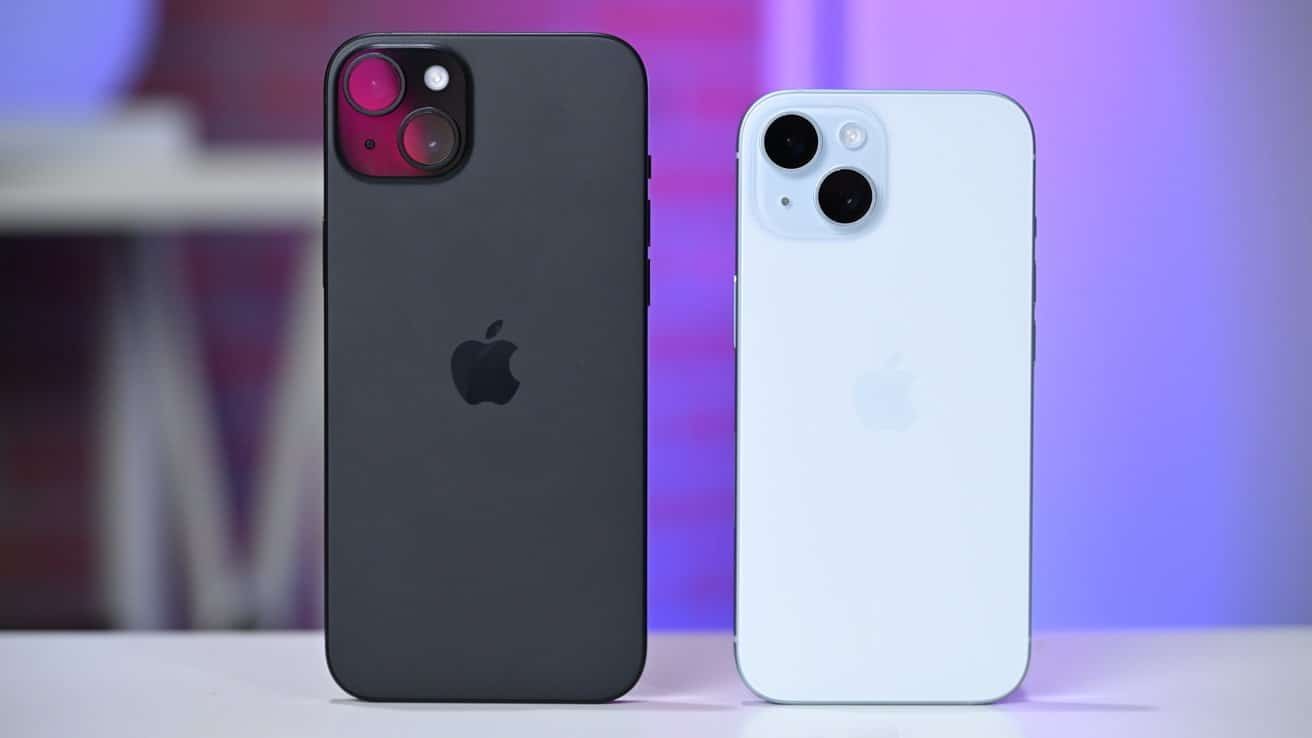 Two smartphones shown from the back, one black and one white, with dual cameras and Apple logos, set against a blurred purple background.