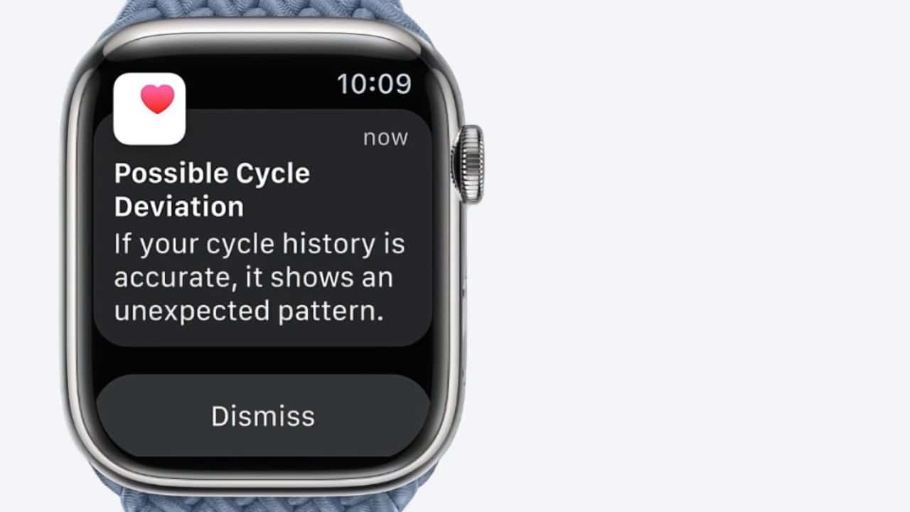 Smartwatch displaying a notification about possible cycle deviation, indicating an unexpected pattern in cycle history, with a dismiss button below. Time reads 10:09.