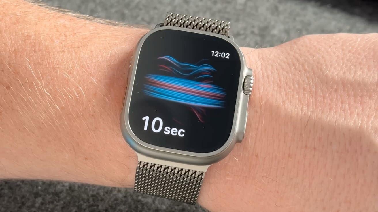 Smartwatch on wrist displaying a colorful abstract digital pattern with the time 12:02 and a countdown of 10 seconds on a black background.
