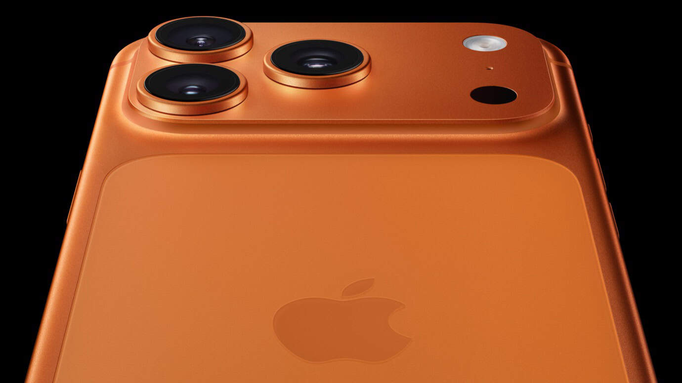 Orange smartphone with three circular camera lenses and a flash on the back, featuring an Apple logo in the center.