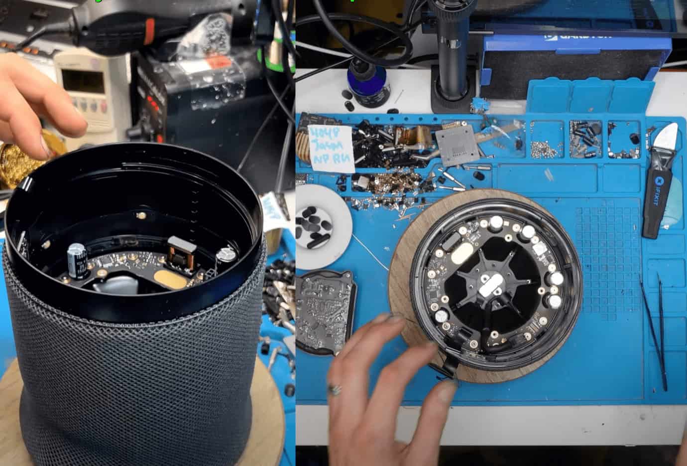 A disassembled smart speaker on a blue workbench with tools and components scattered around.