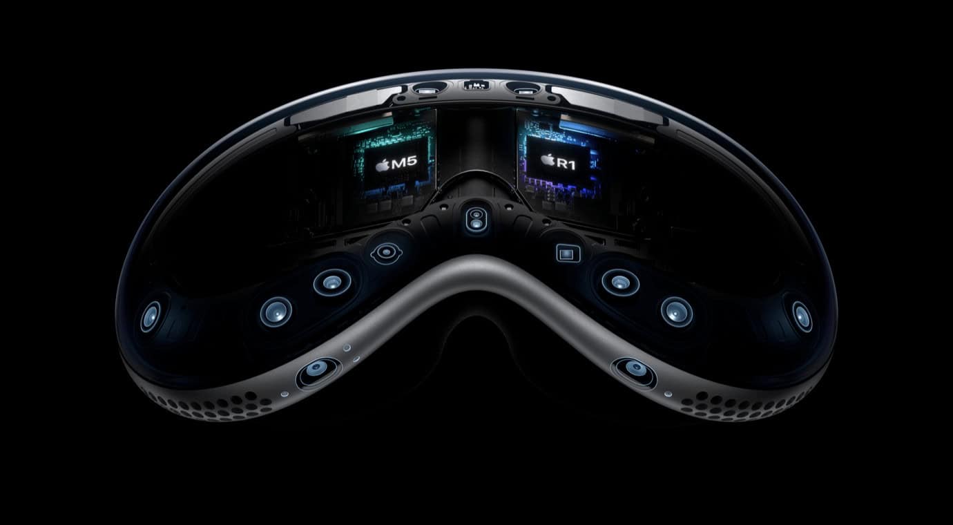 Black virtual reality headset with two screens displaying 'M5' and 'R1.' Features multiple sensors and buttons on the front, set against a black background.